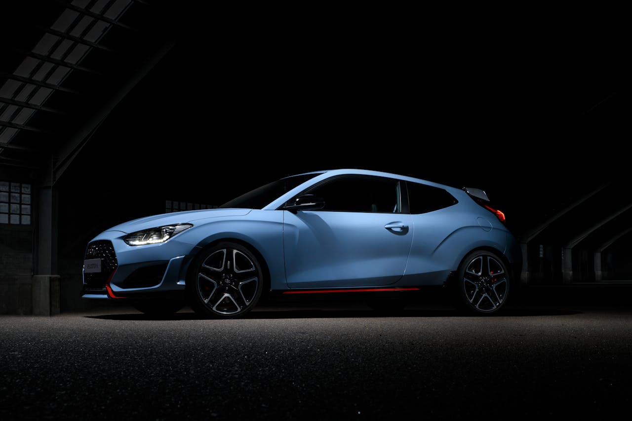 Hyundai Veloster Parked in a Dark Room